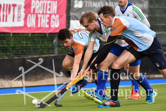 Ben Walker and Ross Canning battle for the ball with Richard Lynch