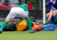 Brendan Parsons shoots as Eoin Connolly attempts to save