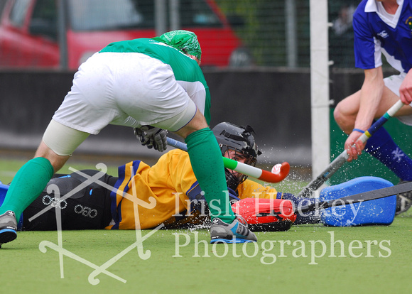 Brendan Parsons shoots as Eoin Connolly attempts to save
