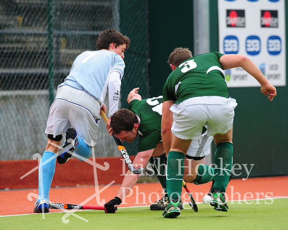 Conor Connolly and David Bane try to tackle Rob Anderson