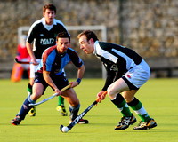 Fingal's Stephen Thompson in possession with TRR's Colin Huet tackling