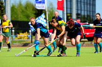 Jean McDonnell tries to get past Aoife and Sinead McCarthy