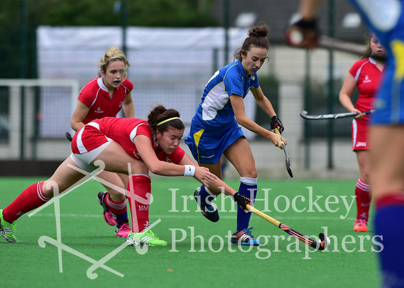 Sarah O'Loughlin tackled by Kerrie Burns