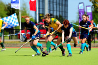 Jean McDonnell tries to get past Aoife and Sinead McCarthy