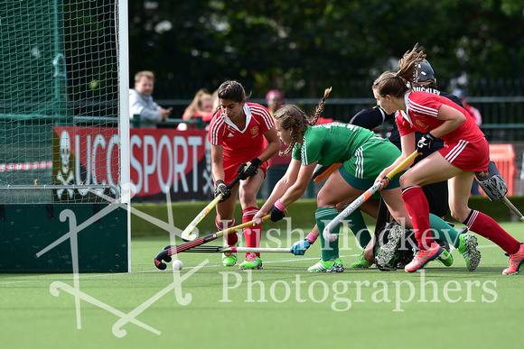 Suzie Kelly and Hannah McLoughlin (not visible) combine to keep out Lily Wolstenholme