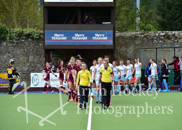 Umpires Gillian Garrett and Alison Keogh lead out the teams