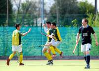 Fergal Keaveney and Ravin Nair celebrate a Peter English goal