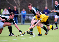 Pembroke's Maurice Elliott tackled by Fingal's Lloyd Pearson and Stephen Thompson