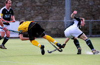 Pembroke's Alan Sothern shoots under ptessure from Fingal's Stephen Thompson