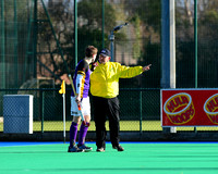 Umpire Ray O'Connor discusses a decision with Ben Grogan