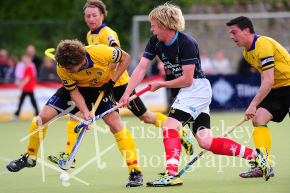 Pembroke's Ronan Gormley tackles Lisnagarvey's Jason Lynch